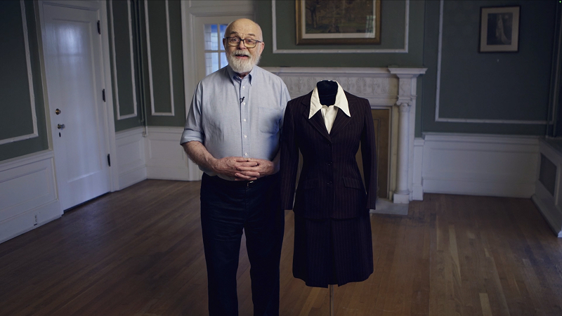 Le costume à rayures brunes